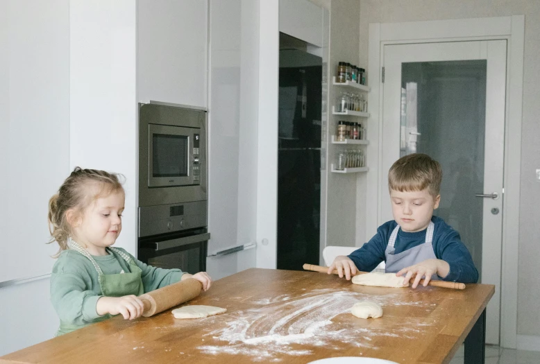 a couple of kids that are sitting at a table, cooking, profile image, ekaterina, thumbnail