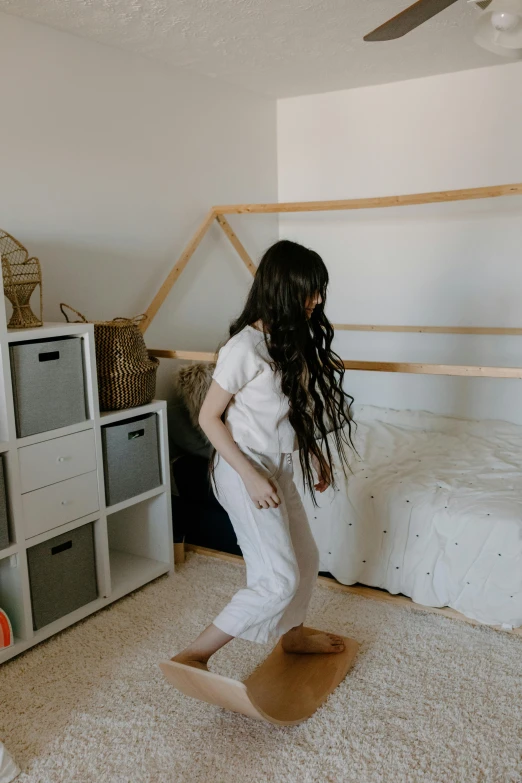 a woman standing on top of a box in a room, inside a child's bedroom, long flowy hair, crawling on the ground, profile image