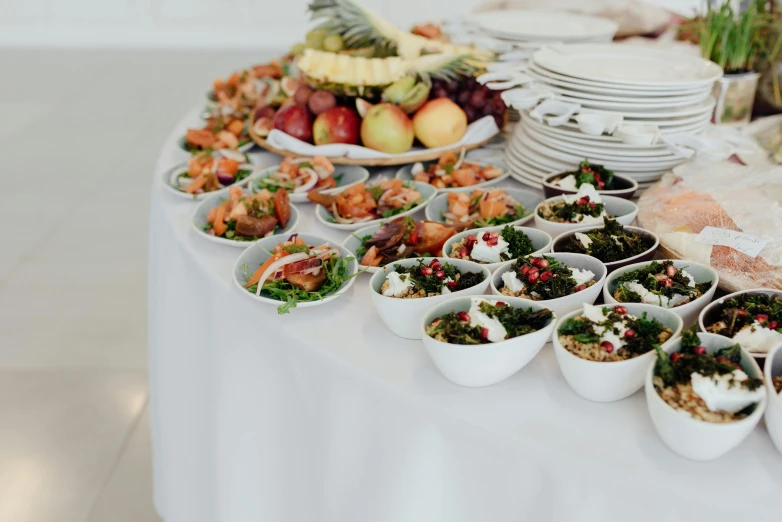 a number of bowls of food on a table, beautifully bright white, profile image, wedding, white