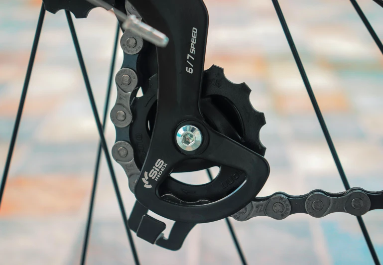 a close up of a bike chain on a bike, by Sven Erixson, unsplash, product view, ultra - realistic, instagram post, black gears