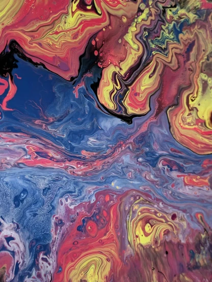 a close up of a painting on a table, inspired by Umberto Boccioni, trending on unsplash, swirly smoke, some red and purple and yellow, /r/earthporn, made of oil and water