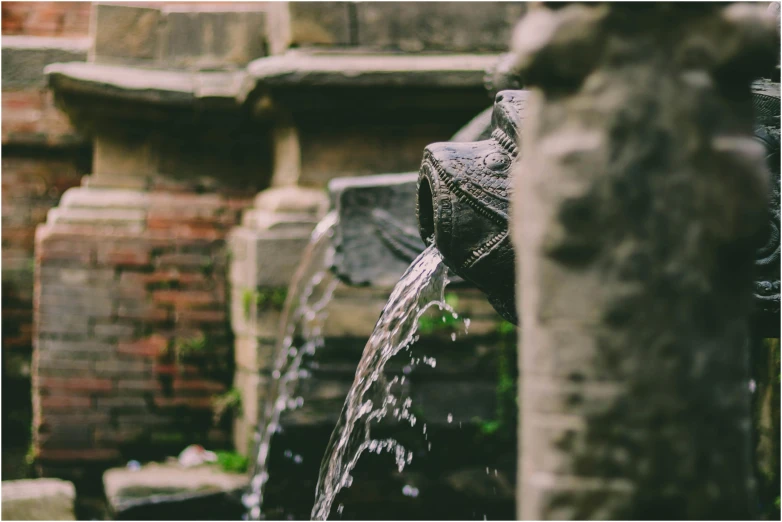 a close up of a fountain with water coming out of it, a screenshot, unsplash contest winner, renaissance, medieval setting, analogue photo quality, urban surroundings, thumbnail