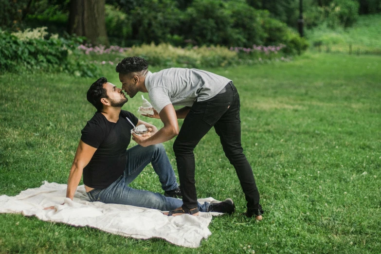 a man giving a woman a bottle of wine, by Meredith Dillman, pexels contest winner, central park, queer, kneeling, two male