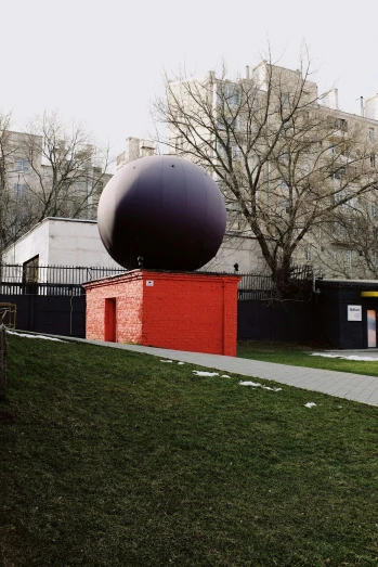 a man flying through the air while riding a skateboard, by Attila Meszlenyi, temporary art, a large sphere of red energy, moscow, watertank, black hole with accretion disс