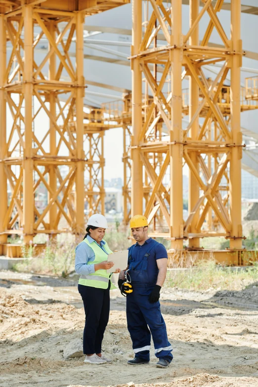 a couple of men standing next to each other on a construction site, pexels contest winner, renaissance, wooden supports, talking, promotional image, extra high resolution