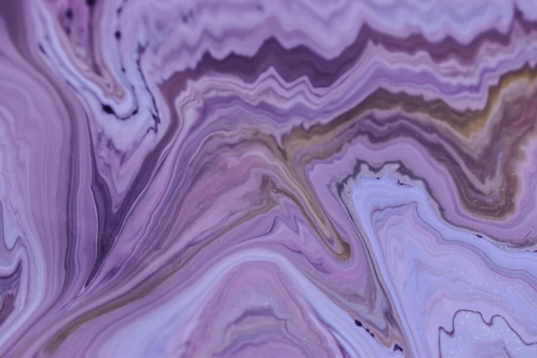 a close up of a piece of marble, inspired by Julian Schnabel, trending on pexels, generative art, purple alien, made of liquid, low quality photo