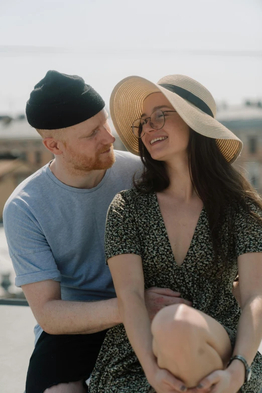 a man and a woman sitting next to each other, pexels contest winner, renaissance, wearing a cute hat, on rooftop, charli bowater and artgeem, zoomed in