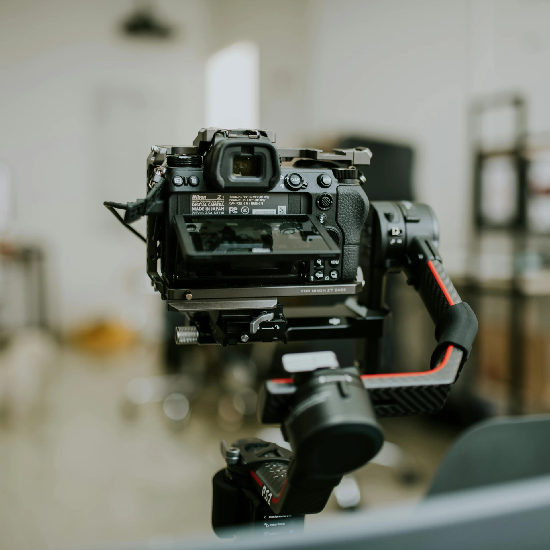a camera sitting on top of a tripod in a room, unsplash, video art, theatre equipment, blurry footage, instagram post, sd video
