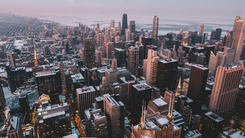 a view of a city from the top of a building, pexels contest winner, chicago skyline, winter season, background image, chillhop