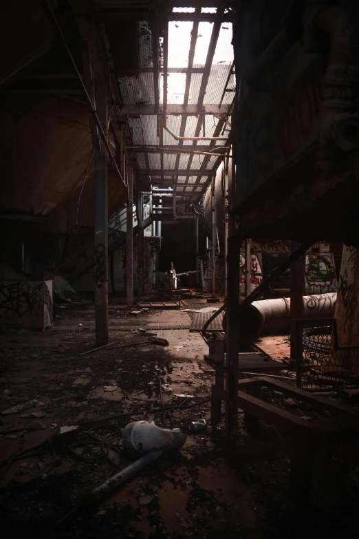 the sun shines through the window of an abandoned building, inspired by senior environment artist, unsplash contest winner, rendered in unreal engine 5, woman in a dark factory, backrooms abandoned mall, luscious ) in the last of us