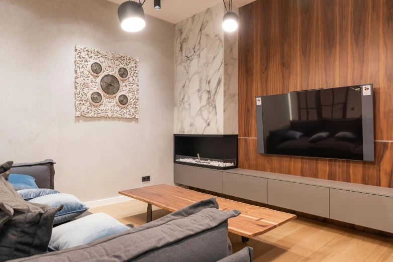 a living room filled with furniture and a flat screen tv, by Adam Marczyński, pexels contest winner, hyperrealism, marble and wood and glass, city apartment cozy calm, modern minimalist f 2 0, wood panel walls