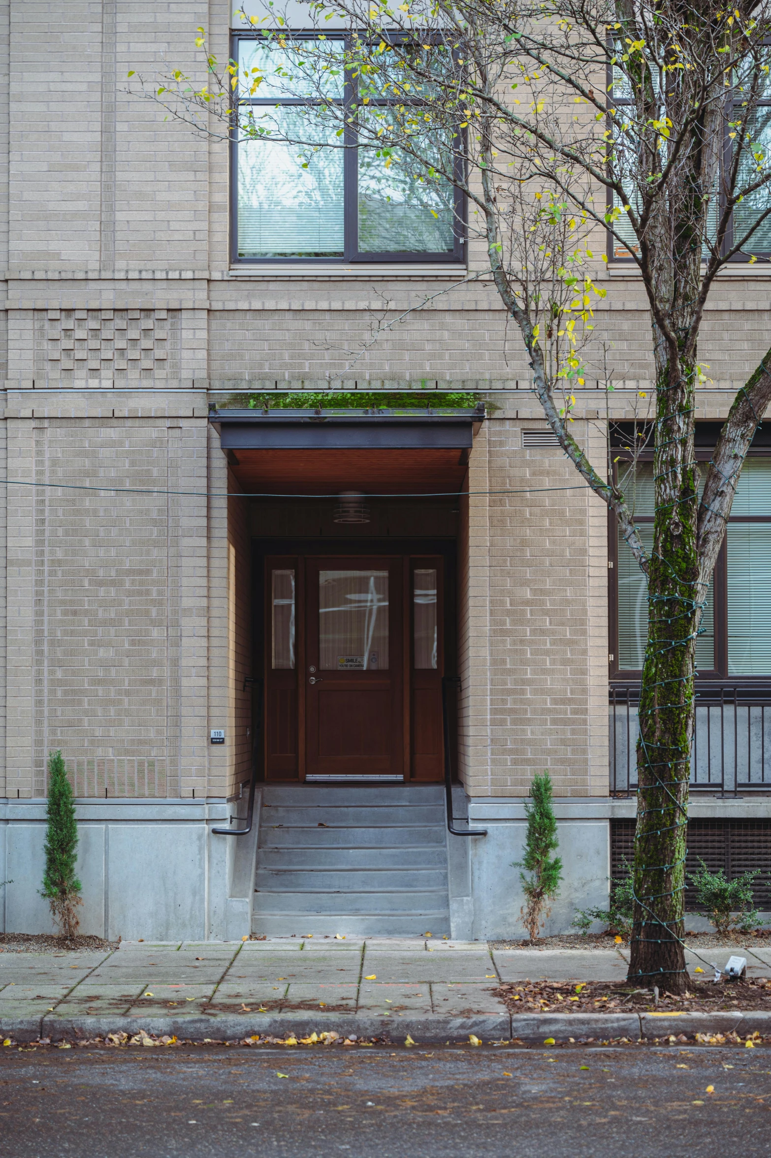 a red fire hydrant sitting in front of a building, inspired by Tōshi Yoshida, art nouveau, small path up to door, panoramic shot, dwell, alex kiesling