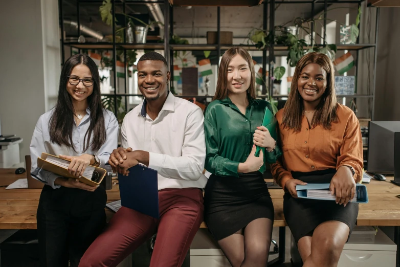 a group of young people sitting next to each other, trending on pexels, renaissance, office clothes, avatar image, ethnic group, professional image