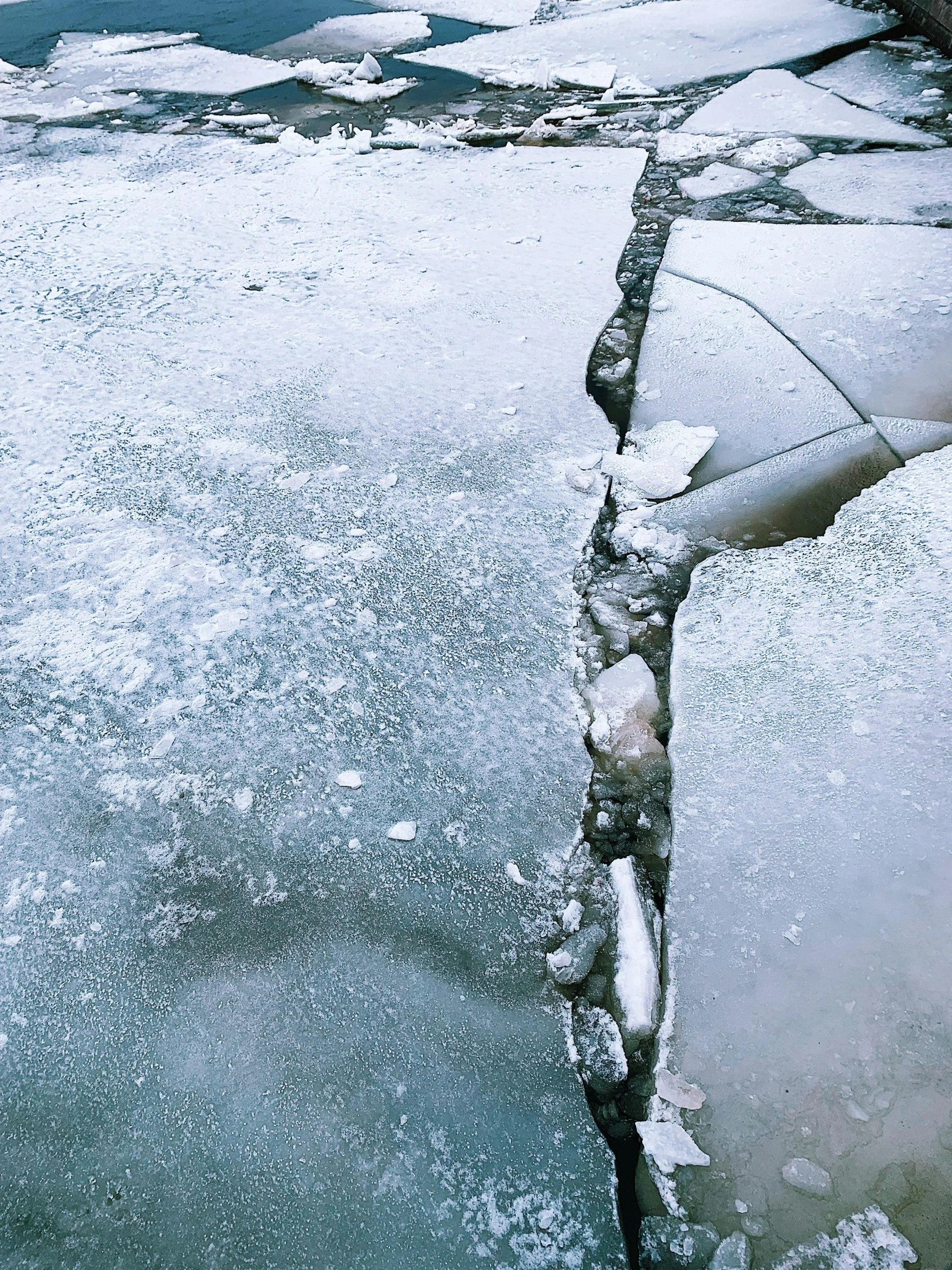 a red fire hydrant sitting on top of a frozen lake, an album cover, trending on pexels, land art, large cracks, grey, pearly flagstones, thumbnail