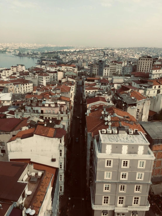 a view of a city from the top of a building, inspired by Niyazi Selimoglu, happening, istanbul, 4 k ”