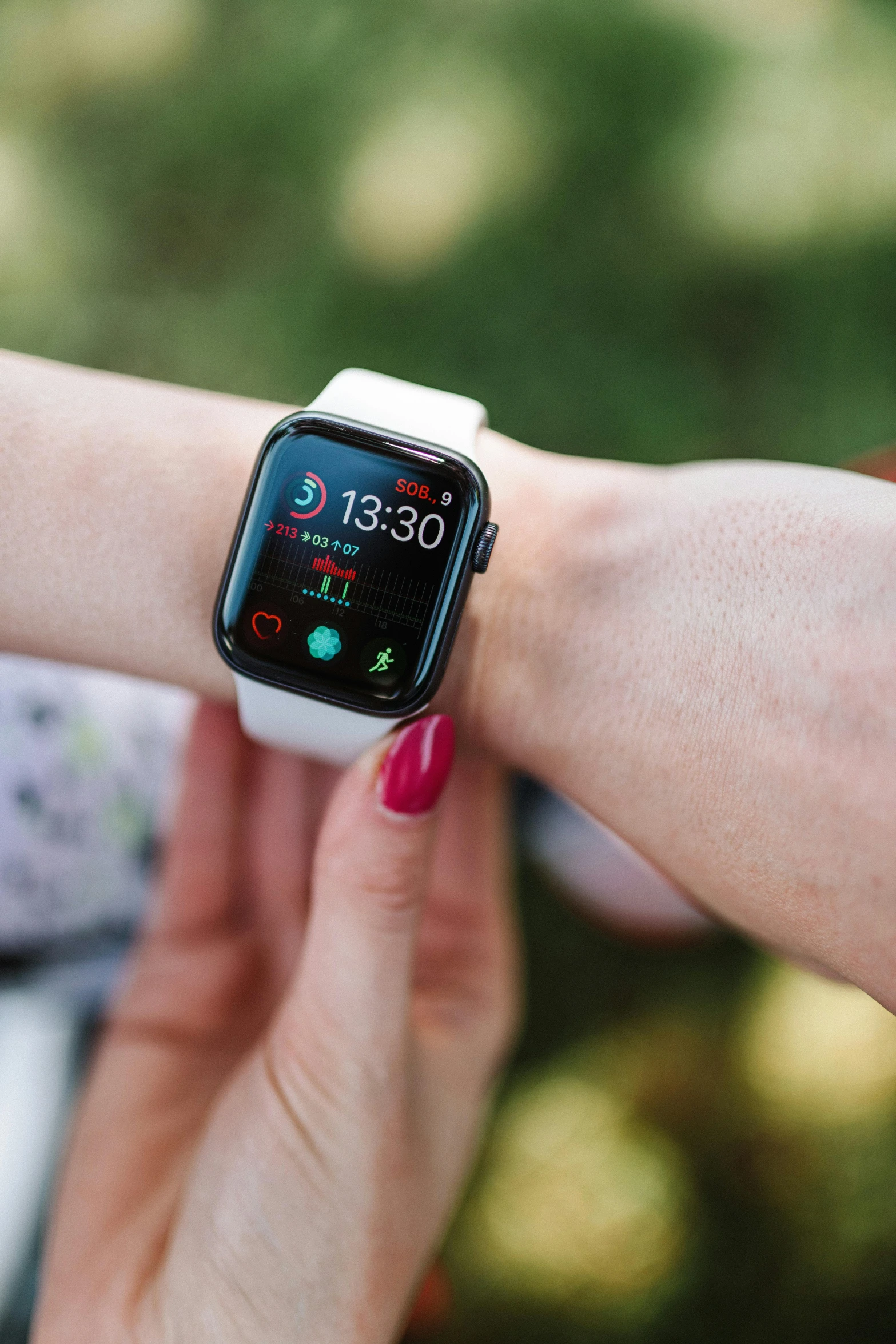 a close up of a person holding an apple watch, by Julia Pishtar, square, scientific, connectivity, summertime