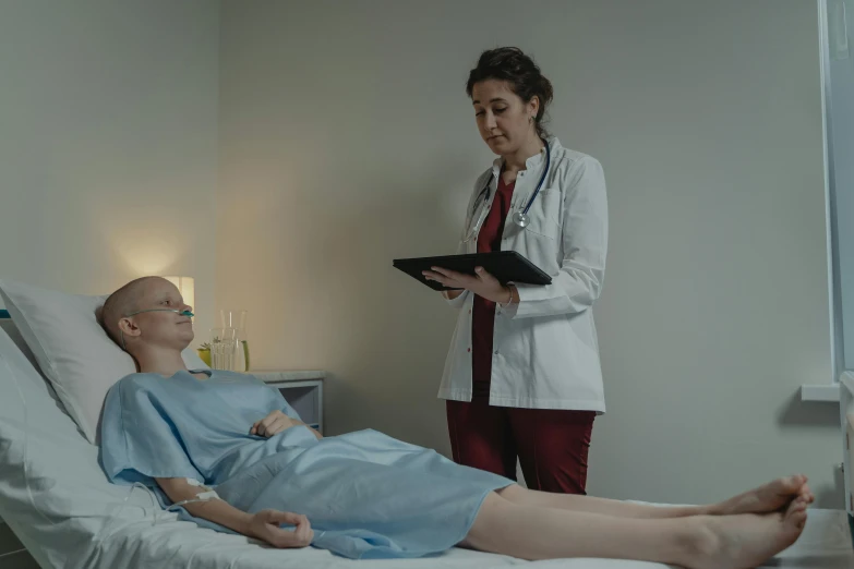 a woman standing next to a man in a hospital bed, a statue, pexels contest winner, massurrealism, vfx shot, (doctor), medium long shot, looking left