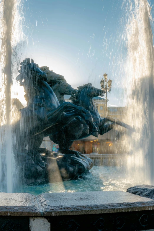 a statue of a man riding a horse in front of a fountain, closeup of magic water gate, nice afternoon lighting, photo from 2022, poseidon