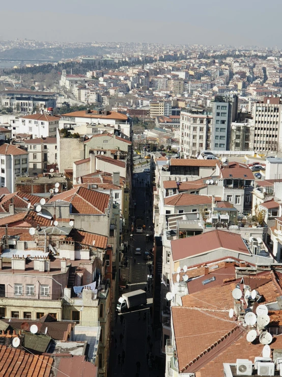 a view of a city from the top of a building, istanbul, high res 8k, multiple stories, random