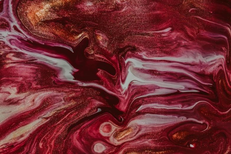 a close up of a liquid painting on a surface, inspired by Tintoretto, trending on pexels, maroon, maroon and white, metallic red, pink