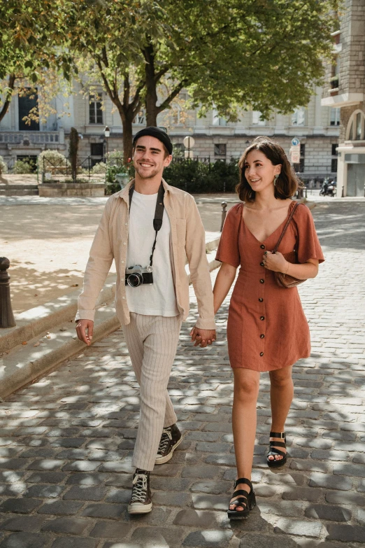 a man and a woman walking down a street, influencer, borja, happy couple, lots de details