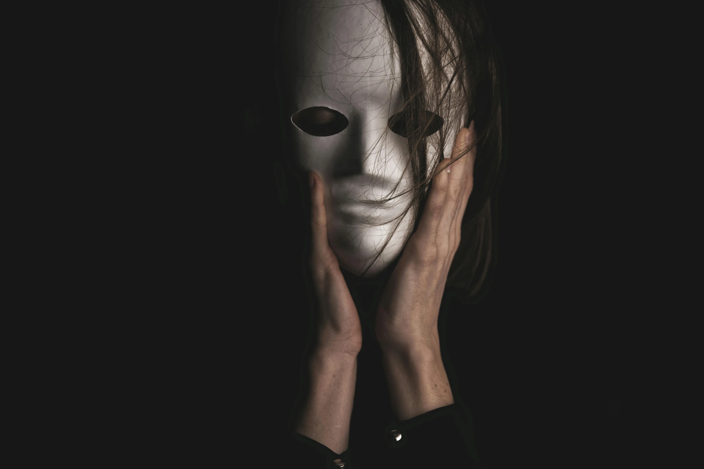 a woman with a white mask covering her face, inspired by Nicola Samori, pexels contest winner, antipodeans, scary pose, humanoid face, a photo of a man, jigsaw