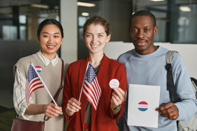 three people standing next to each other holding american and korean flags, pexels contest winner, renaissance, educational supplies, woman holding sign, people at work, brown