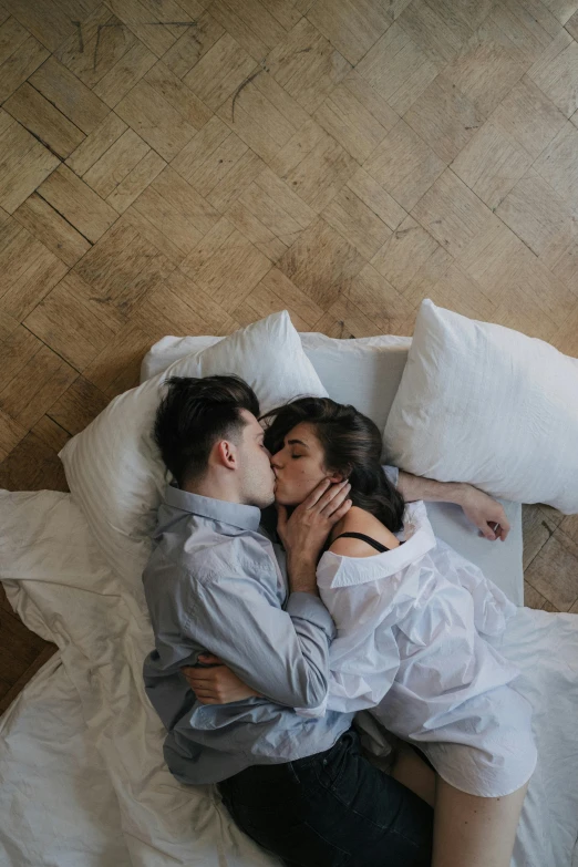 a man and a woman laying on top of a bed, pexels contest winner, romanticism, marton gyula kiss ( kimagu ), ariel view, julia gorokhova, jen atkin