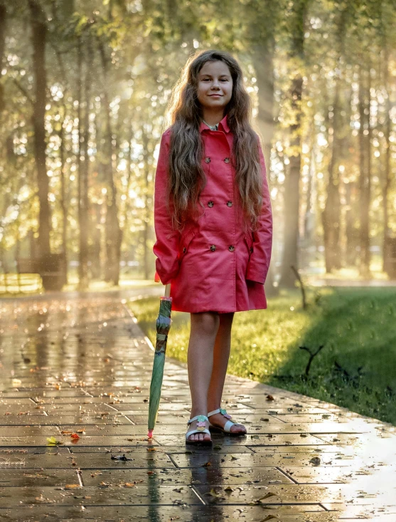 a little girl standing in the rain with an umbrella, an album cover, by Lilia Alvarado, pixabay contest winner, wearing red jacket, award winning colorized photo, today\'s featured photograph 4k, strong sunlight