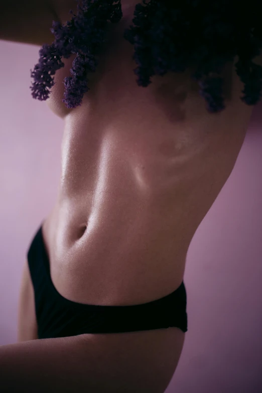 a close up of a person in a bikini, an album cover, inspired by Elsa Bleda, trending on pexels, massurrealism, ((purple)), ribcage, young and slender, beautiful midriff