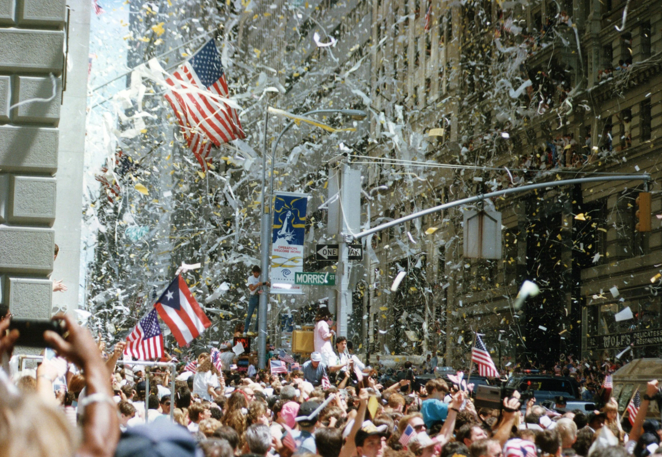 a crowd of people with american flags and confetti, a photo, inspired by Garry Winogrand, pexels contest winner, 🌸 🌼 💮, john berkey white plastic panels, olympics footage, celebrating a king being crowned