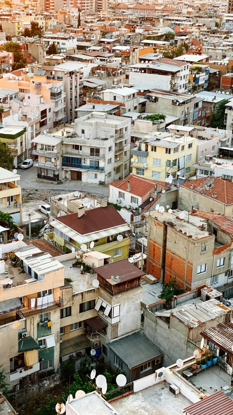 a city filled with lots of tall buildings, pexels, cyprus, shanty townships, top - down photograph, square