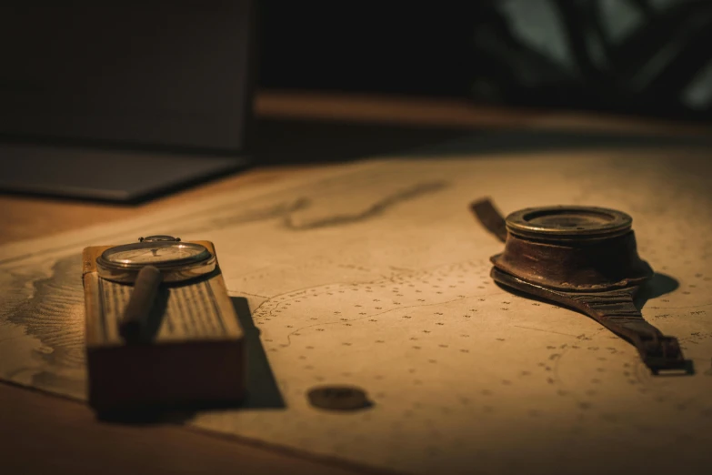 a pair of scissors sitting on top of a table, pexels contest winner, analytical art, nautical maps, steam workshop maps, explorers, 3 / 4 wide shot