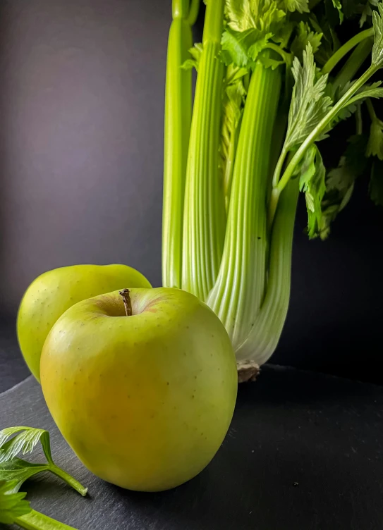 a bunch of celery and an apple on a table, inspired by Robert Mapplethorpe, unsplash, renaissance, background image, medium closeup shot, large tall, portrait n - 9