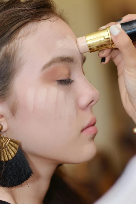 a woman putting makeup on another woman's face, inspired by Tang Di, renaissance, closeup of face melting, promo image, foundation, stripe over eye