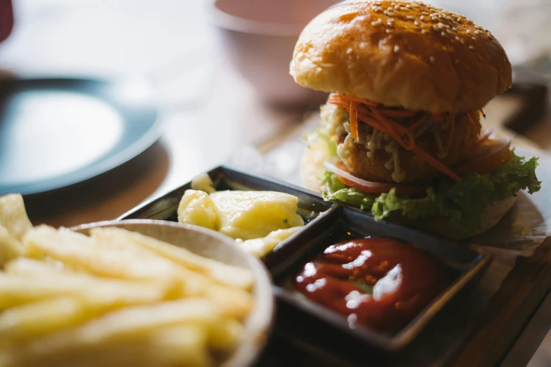 a close up of a plate of food on a table, unsplash, hamburgers, thumbnail, malaysian, style of chippy