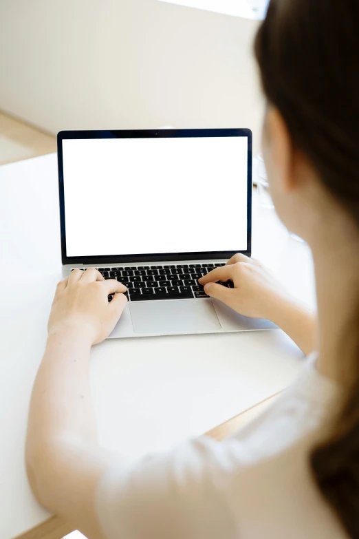 a woman sitting at a table using a laptop computer, a computer rendering, pexels, square, white space in middle, high quality photo, medium closeup