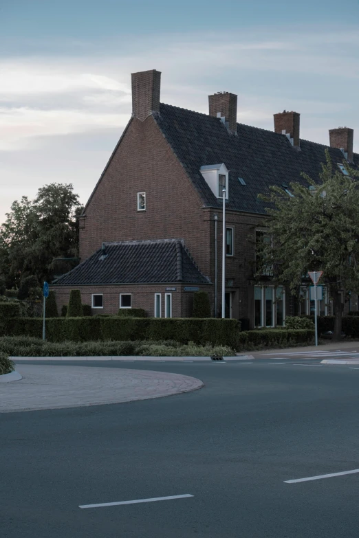 a couple of houses sitting on the side of a road, inspired by Willem de Poorter, unsplash, hyperrealism, very detailed curve, late summer evening, cinematic shot ar 9:16 -n 6 -g, town square