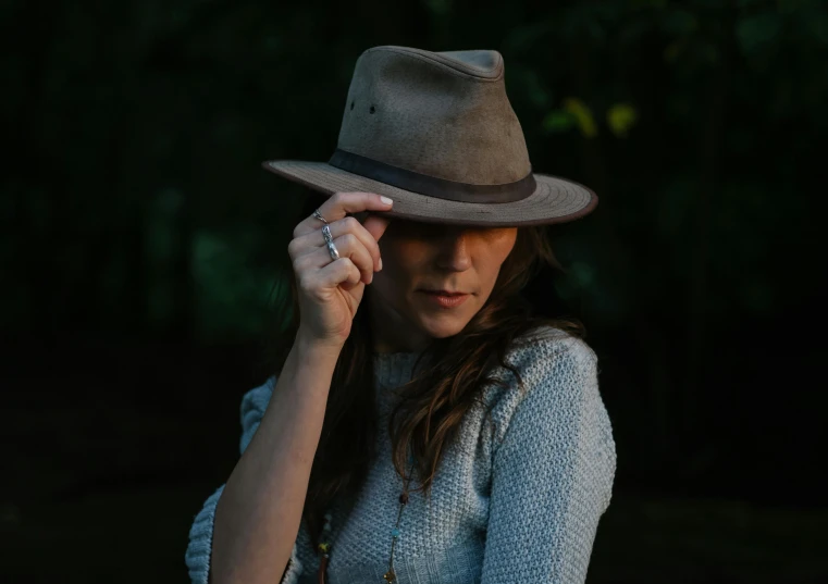 a close up of a person wearing a hat, inspired by James Dickson Innes, unsplash contest winner, australian tonalism, portrait of a female ranger, grey, full product shot, mid length portrait photograph