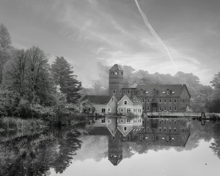 a black and white photo of a house on a lake, a black and white photo, inspired by Patrick Nasmyth, tonalism, tall factory, mills, fine art print, pink reflections