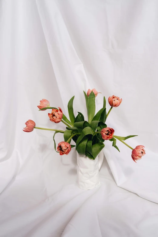 a white vase with some pink flowers in it, inspired by François Boquet, unsplash, tulip, melting in coral pattern, tufted softly, ( ultra realistic