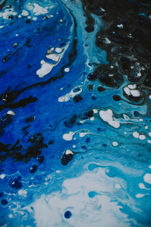 a close up of a blue and black painting, an acrylic painting, reddit, abstract art, resin and clay art, sea of milk, ilustration, made of liquid