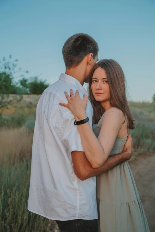 a man and woman standing next to each other in a field, a picture, trending on pexels, arm around her neck, attractive girl, 15081959 21121991 01012000 4k, soft shade