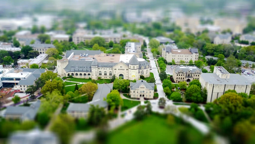 a view of a college campus from a bird's eye view, a tilt shift photo, by Kurt Roesch, instagram photo, iu, blurry image