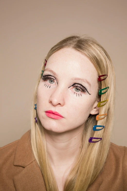 a woman with colorful hair clips on her head, an album cover, inspired by Bert Stern, trending on pexels, extremely pale blond hair, large black eyes, {uncertain look}, hana alisa omer