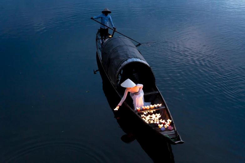 a person in a boat on a body of water, inspired by Steve McCurry, pexels contest winner, conceptual art, ao dai, last light, vendors, taking from above