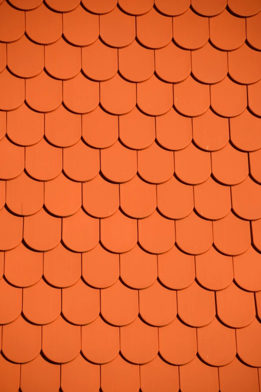a close up of the roof of a house, inspired by Christo, pexels contest winner, tessellation, dark orange, square, shields