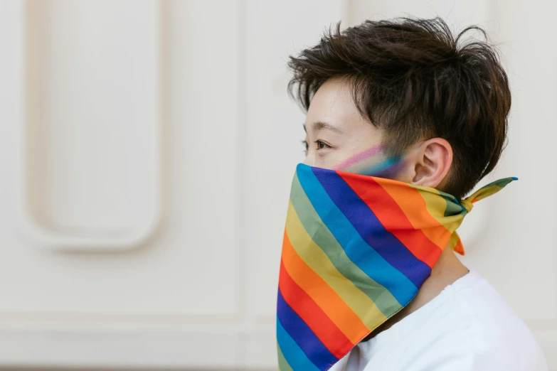 a close up of a person wearing a face mask, inspired by Okuda Gensō, trending on unsplash, shin hanga, wearing a scarf, lgbt, hong june hyung, trans rights