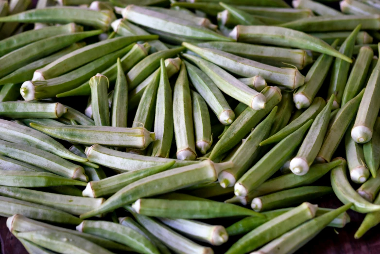 a pile of oklery sitting on top of a table, garis edelweiss, with slight stubble, thumbnail, square