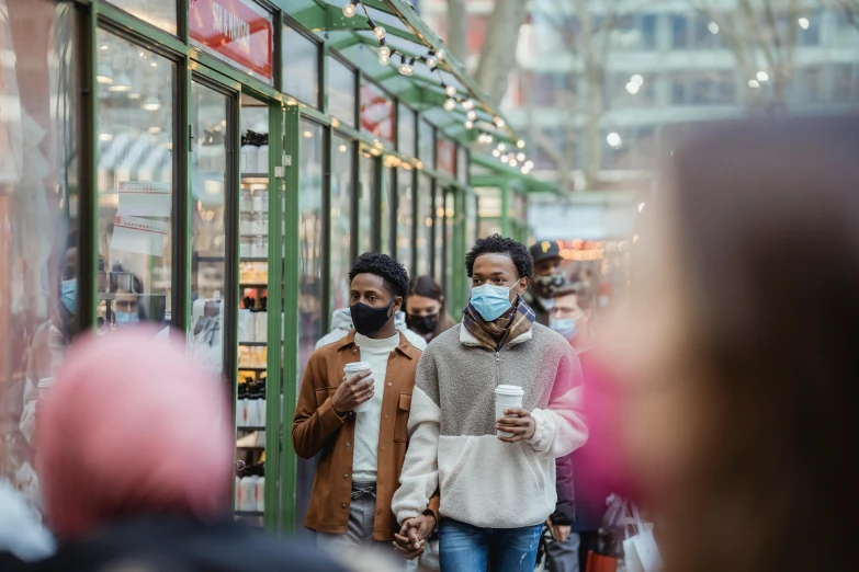 a group of people walking down a crowded street, trending on pexels, surgical mask covering mouth, fresh food market people, black man, facing each other